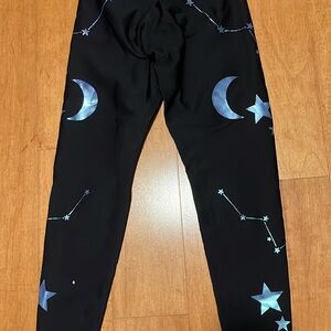 Ultracor black and shimmer blue Star and Moon leggings medium